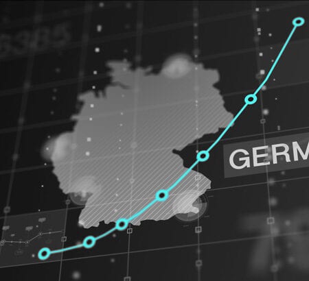 Eine Deutschlandkarte mit einem Aktienkurs.