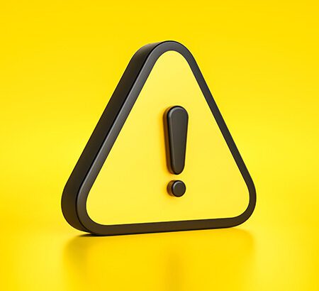 ein schwarzes Ausrufezeichen auf gelbem Hintergrund; Symbol für eine Warnung
