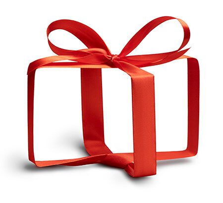 Rotes Geschenkband, das um ein unsichtbares Geschenk gewickelt wurde und so als Symbol für Nießbrauch steht